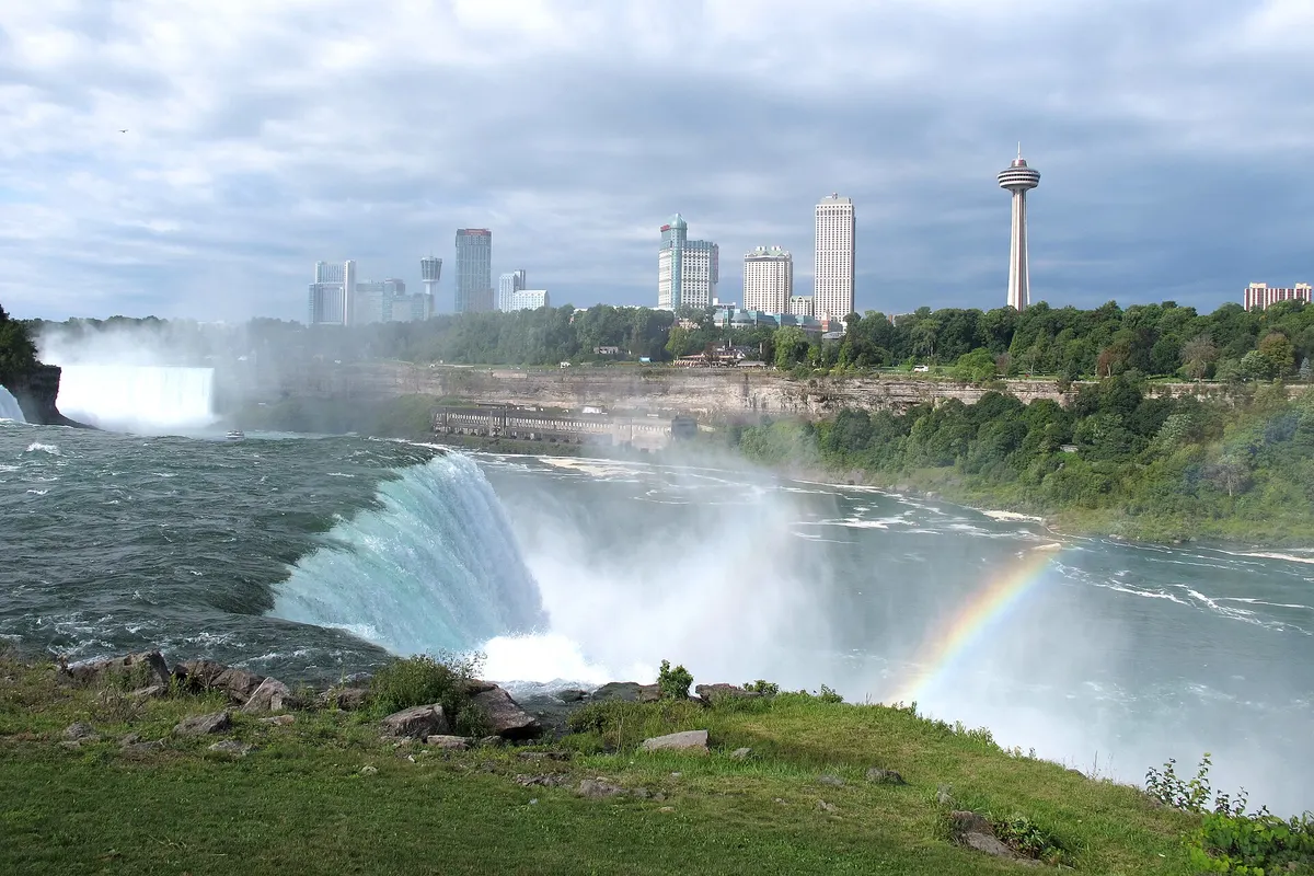 The Horseshoe Falls at Niagara with a rainbow in the spray, on the border between Canada and the US